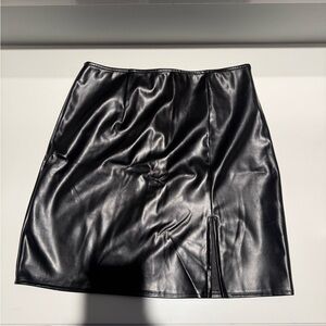 Black leather mini skirt